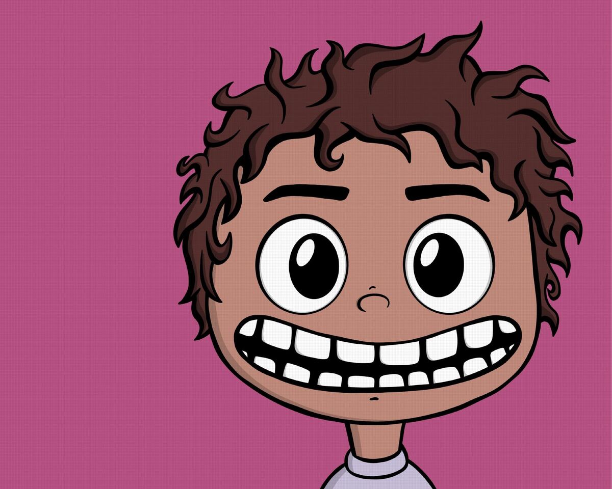 A grinning boy with curly brown hair.